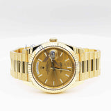Rolex Day-Date 40 Ref. 228238-0003 Champagne Roman Dial 18k Yellow Gold