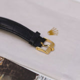Rolex Cellini 5112/8 32mm 18K Yellow Gold White Roman Dial Black Leather Strap